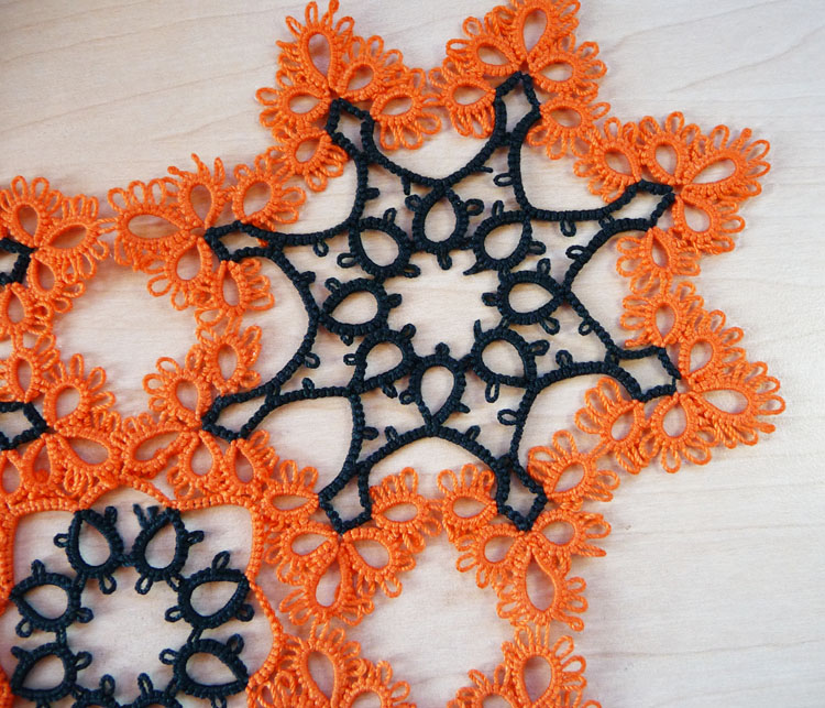 Bicolored square tatting doily with orange star and green center on white background by FairyLacefromElena