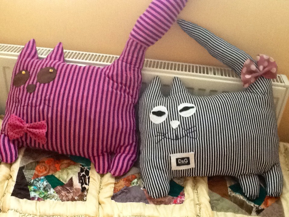Two striped fabric cat pillows, handmade for my granddaughter’s room during quarantine, when I was teaching her tatting — by FairyLacefromElena.