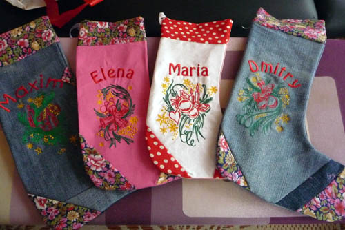 Four handmade embroidered Christmas stockings, festive holiday tradition for children, made by FairyLacefromElena