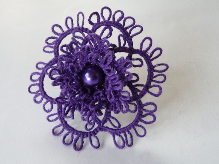 Purple tatting ring with bead